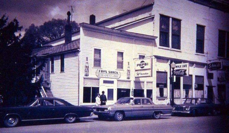Historic casual snapshot showing operators outside Fay's Shack restaurant